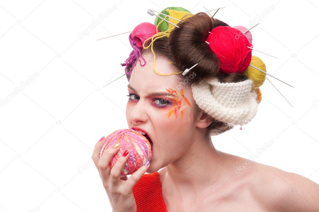 Closeup fashion woman with color face art in knitting style