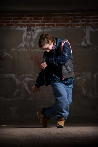 stock image Hip hop dancer in modern style over brick wall