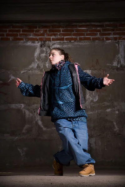 stock image Hip hop dancer in modern style over brick wall