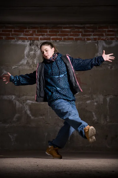 stock image Hip hop dancer in modern style over brick wall