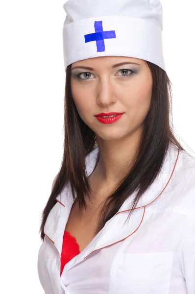 Mujer sexy con labios rojos y uniforme médico — Foto de Stock