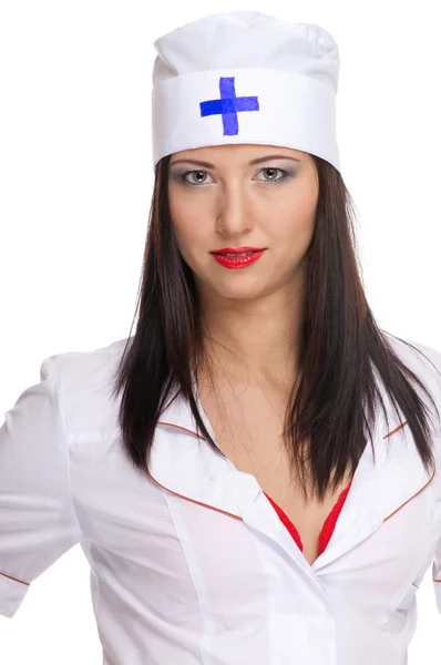Сексуальная женщина с красными губами и медицинской формой — стоковое фото