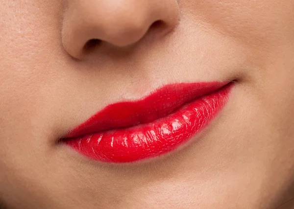 Sexy vrouw met rode lippen en medische uniform — Stockfoto