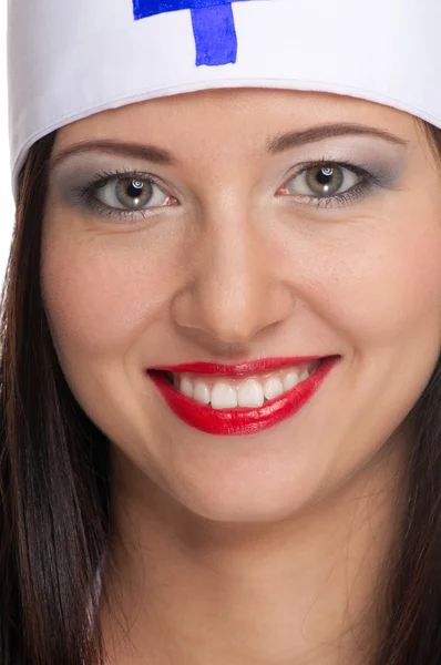 Mulher sexy com lábios vermelhos e uniforme médico — Fotografia de Stock