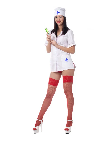 Сексуальная женщина-медик со шприцем. изолированные . — стоковое фото