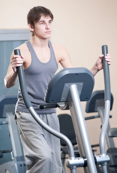 Young man at the gym exercising. Running — Stock Photo, Image