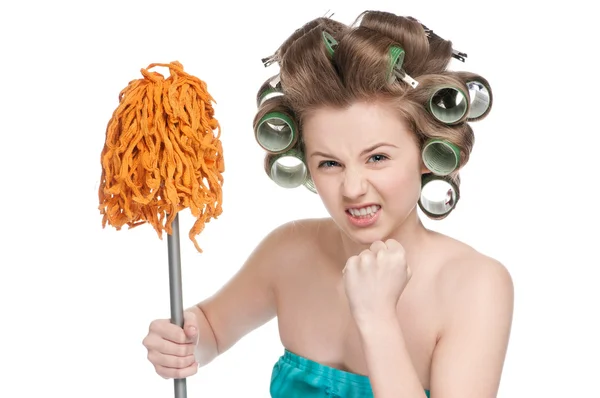 Donna arrabbiata in rulli per capelli è in possesso di tampone — Foto Stock