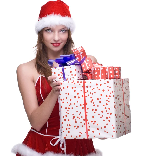 Жінка в сукні Санта-Клауса з подарунками — стокове фото