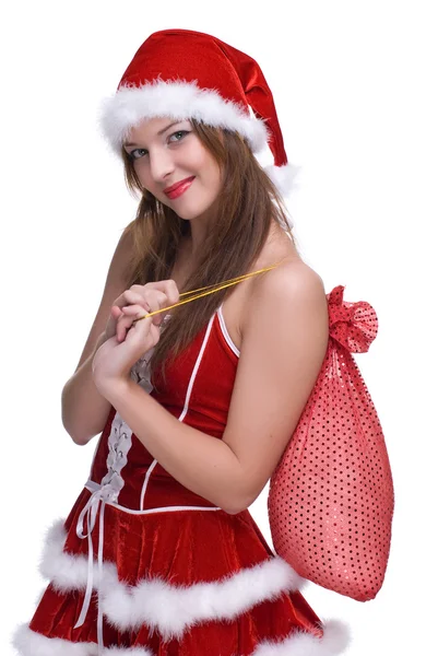 Kobieta w sukni i prezenty torba na santa klauzuli — Zdjęcie stockowe