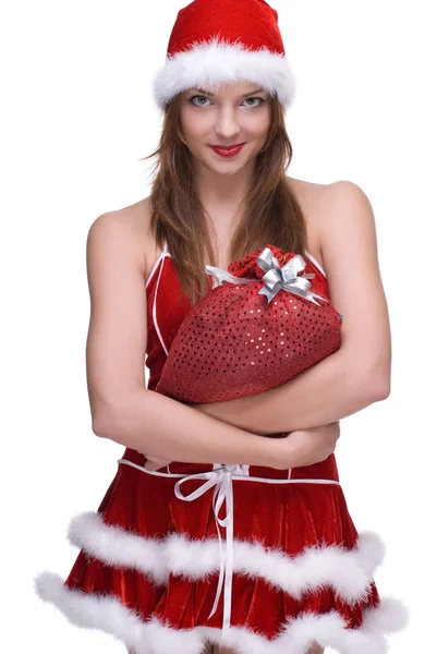 Frau in Weihnachtsmann-Kleid und Geschenktüte — Stockfoto