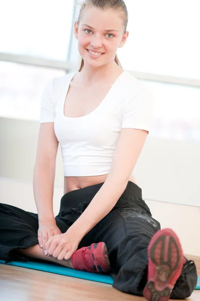 Young woman doing yoga exercises — Stock Photo, Image