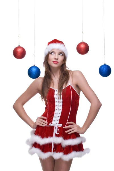 Retrato de close-up da menina no vestido de Papai Noel e bolas de Natal — Fotografia de Stock