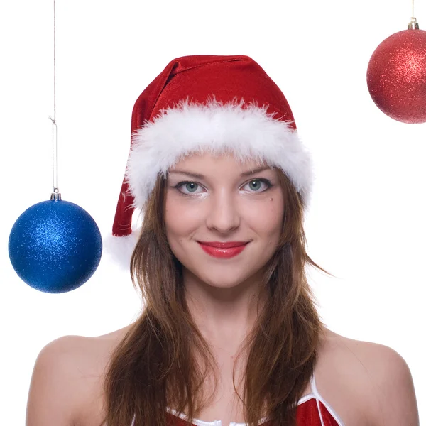 Woman in santa dress and christmas balls — Stock Photo, Image