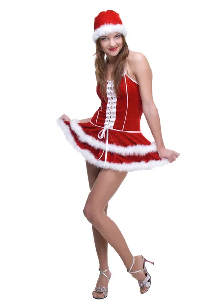 Красива танцююча жінка в сукні Санта-Клауса — стокове фото