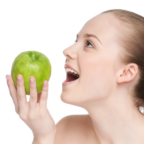 Woman eat green apple Stock Image