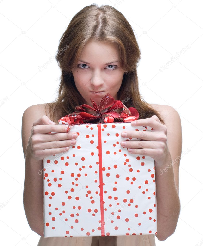 Closeup portrait of angry woman with big gift