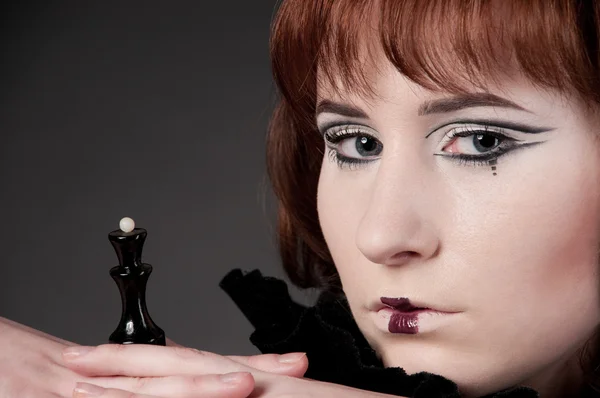 Close-up portrait of beautiful girl with chess makeup — Stock Photo, Image