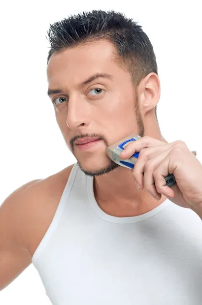 Young handsome man shaving — Stock Photo, Image
