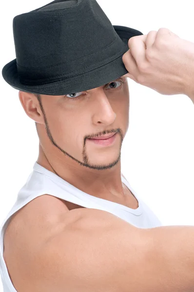 Young handsome man in black hat — Stock Photo, Image