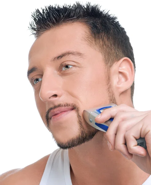 Jovem homem bonito barbear — Fotografia de Stock