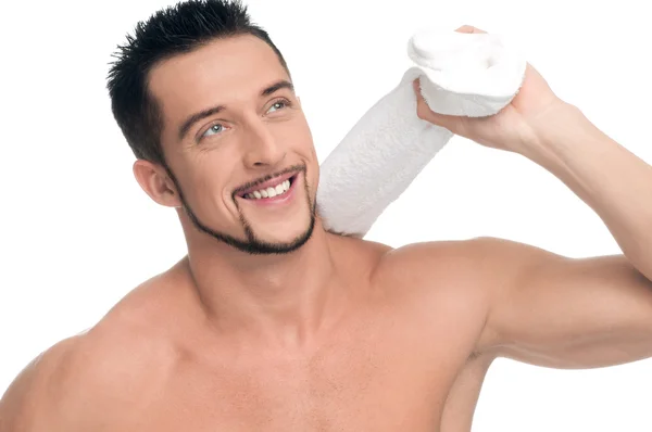 Mladý muž s bílým ručníkem. lázně. samostatný. — Stock fotografie