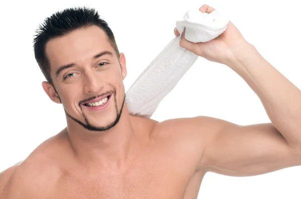 Young man with white towel. SPA. Isolated. — Stock Photo, Image