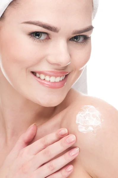 Woman applying moisturizer cream on shoulders — Stock Photo, Image