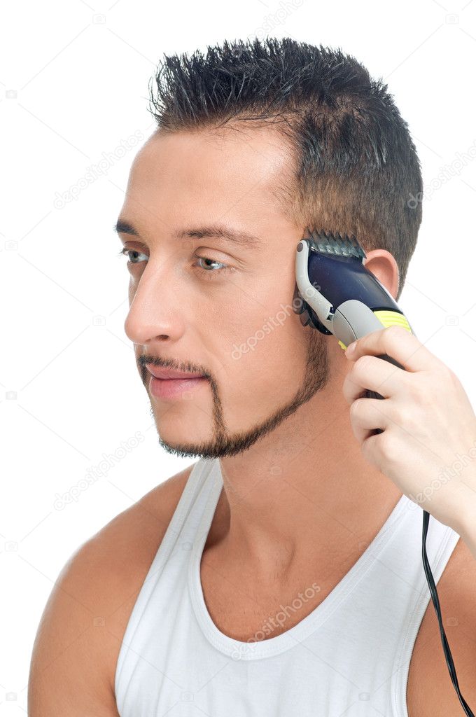 Cutting hairs of attractive man