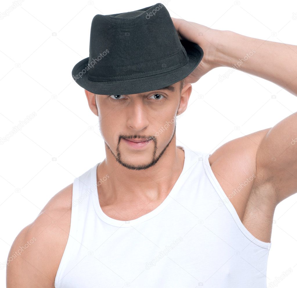 Young handsome man in black hat