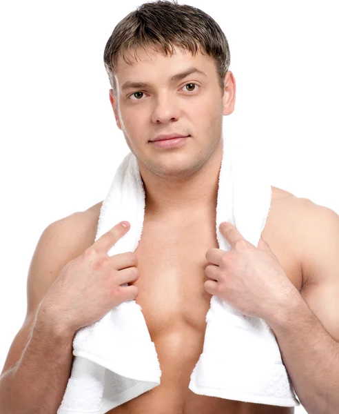 Um jovem com uma toalha — Fotografia de Stock