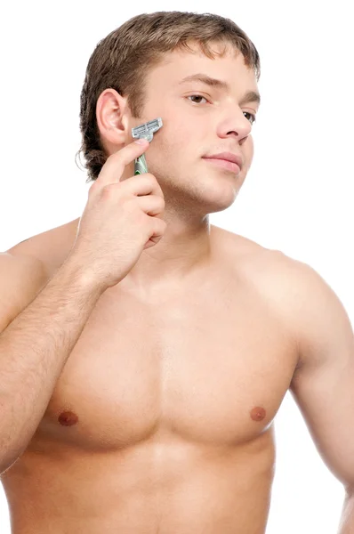 Porträt eines jungen, gutaussehenden Mannes beim Rasieren — Stockfoto