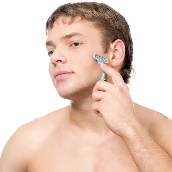 Portrét mladého hezkého muže holení — Stock fotografie