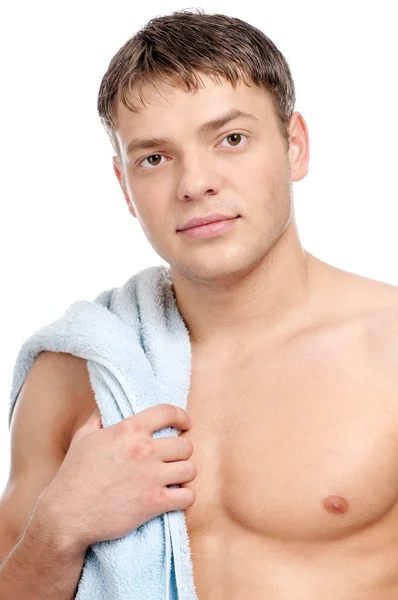 Bir havlu ile genç bir adam — Stok fotoğraf