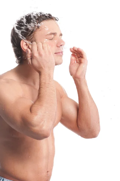 Young man wash face — Stock Photo, Image
