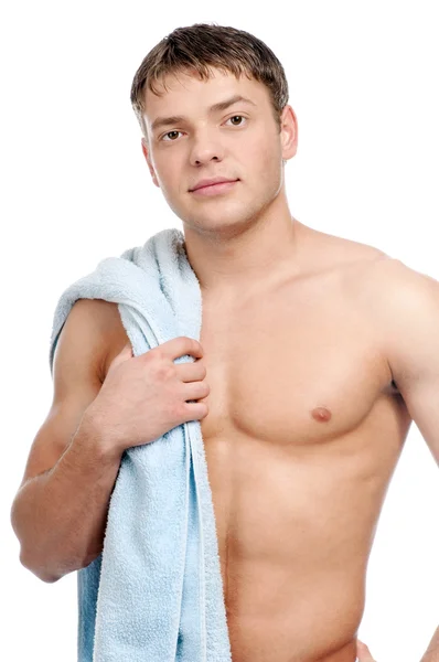 Ένας νεαρός άνδρας με μια πετσέτα — Φωτογραφία Αρχείου