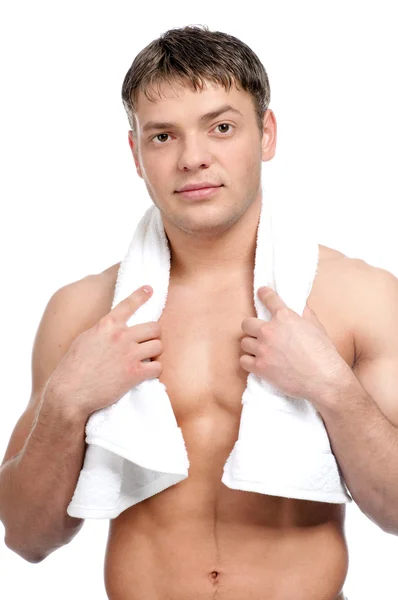 Un jeune homme avec une serviette — Photo