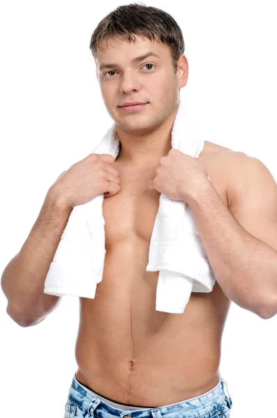 En ung man med en handduk — Stockfoto