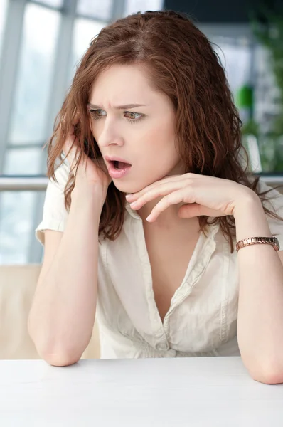 Emotional Business woman with phone at cafe — Stock Photo, Image