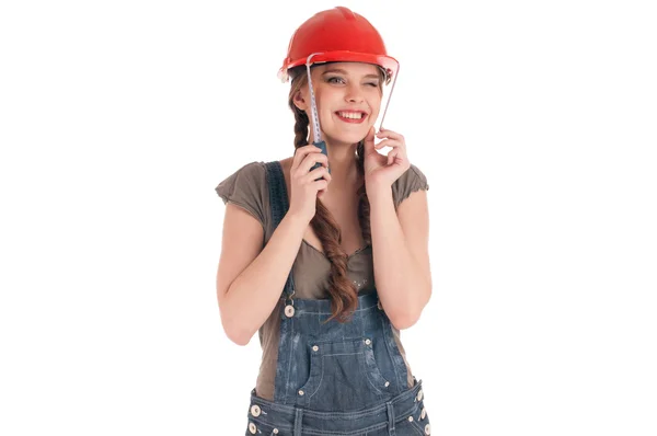 Jonge speelse werknemers vrouw met tape maatregel — Stockfoto
