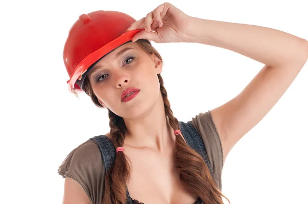 Jonge speelse werknemers vrouw in overall en helm — Stockfoto