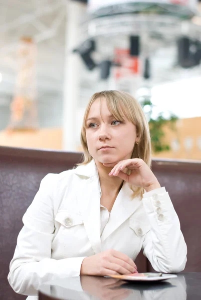 Young businesswoman waiting in cafe — Stock Photo, Image