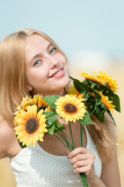 Happy woman on picnic in wheat field clipart