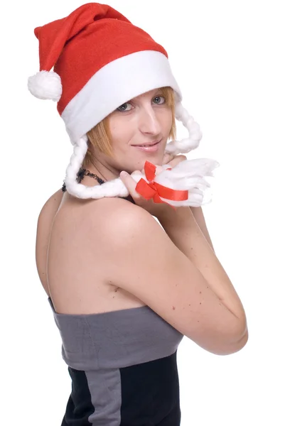 Close up portrait of girl in grey dress and santa claus hat — Stock Photo, Image