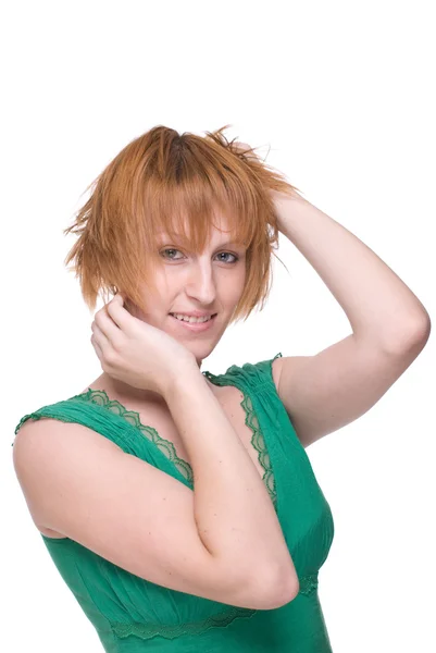 Portret dziewczynka emocjonalność w zieloną sukienkę z bliska — Zdjęcie stockowe