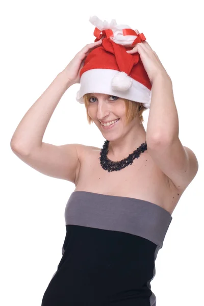 Закрыть портрет девушки в сером платье и шляпе Санта Клауса — стоковое фото