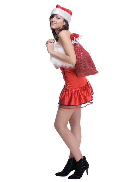 Woman in santa dress with bag — Stock Photo, Image