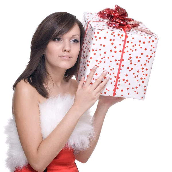 Frau im Weihnachtsmannkleid mit Geschenken — Stockfoto