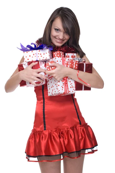 Close-up van portret van meisje in santa jurk met geschenken — Stockfoto
