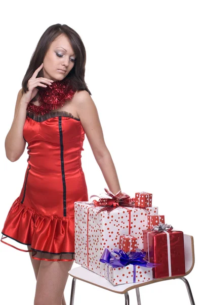 Primer plano retrato de chica en vestido de santa con regalos —  Fotos de Stock