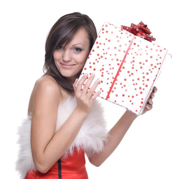 Жінка в сукні Санта з подарунками — стокове фото